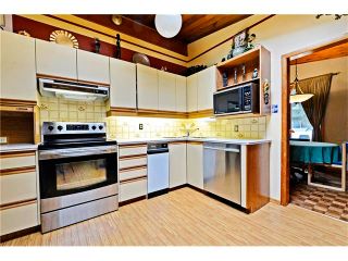 Photo 8: 3527 LAKESIDE Crescent SW in Calgary: Lakeview House for sale : MLS®# C4035307