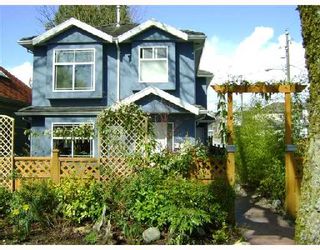 Photo 1: 1851 E 13TH Avenue in Vancouver: Grandview VE 1/2 Duplex for sale (Vancouver East)  : MLS®# V700667
