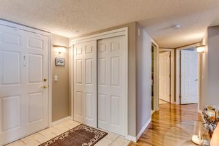 Photo 2: 1311 1311 Hawksbrow Point NW in Calgary: Hawkwood Apartment for sale : MLS®# A1167227