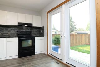 Photo 10: 53 SUMMERWOOD Road SE: Airdrie Semi Detached for sale : MLS®# A1132429