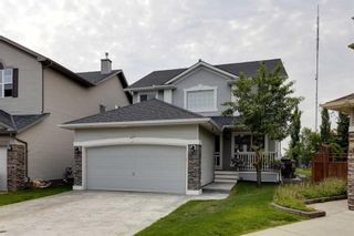 Photo 1: 35 Cougarstone Landing SW in Calgary: Cougar Ridge Detached for sale : MLS®# A2063797