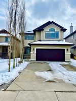 Main Photo: 1A Tusslewood Drive NW in Calgary: Tuscany Detached for sale : MLS®# A2116785