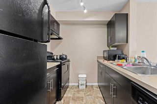 Photo 7: 404 7130 80 Avenue NE in Calgary: Saddle Ridge Apartment for sale : MLS®# A2111706