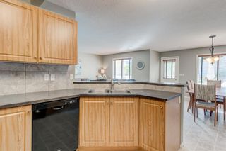 Photo 10: 69 Cougarstone Villas SW in Calgary: Cougar Ridge Detached for sale : MLS®# A1039696