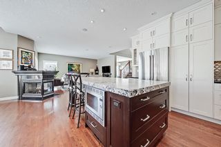 Photo 8: 155 Springbluff Heights SW in Calgary: Springbank Hill Detached for sale : MLS®# A2031782