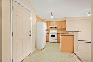Photo 4: 2202 70 Panamount Drive NW in Calgary: Panorama Hills Apartment for sale : MLS®# A1252009