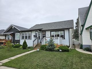Photo 2: 856 Garfield Street North in Winnipeg: Sargent Park Residential for sale (5C)  : MLS®# 202323947