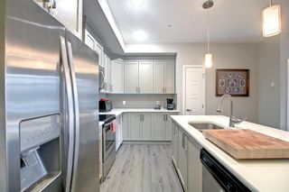 Photo 6: 102 6703 New Brighton Avenue SE in Calgary: New Brighton Apartment for sale : MLS®# A1215599