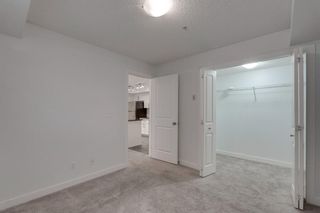 Photo 18: 9104 403 Mackenzie Way SW: Airdrie Apartment for sale : MLS®# A1258339
