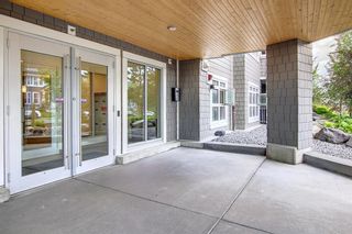 Photo 2: 218 25 Auburn Meadows Avenue SE in Calgary: Auburn Bay Apartment for sale : MLS®# A1237863