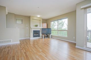 Photo 2: 11 20350 68 Avenue in Langley: Willoughby Heights Townhouse for sale in "SUNRIDGE" : MLS®# R2389347