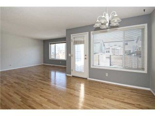 Photo 6: 113 COUGARSTONE Place SW in CALGARY: Cougar Ridge Residential Attached for sale (Calgary)  : MLS®# C3598233