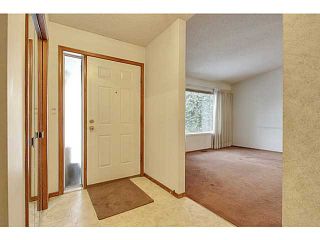 Photo 2: 111 LINCOLN Manor SW in Calgary: Lincoln Park Residential Attached for sale : MLS®# C3645998