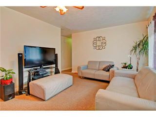 Photo 4: 4232 7 Avenue SW in Calgary: Rosscarrock House for sale : MLS®# C4078756