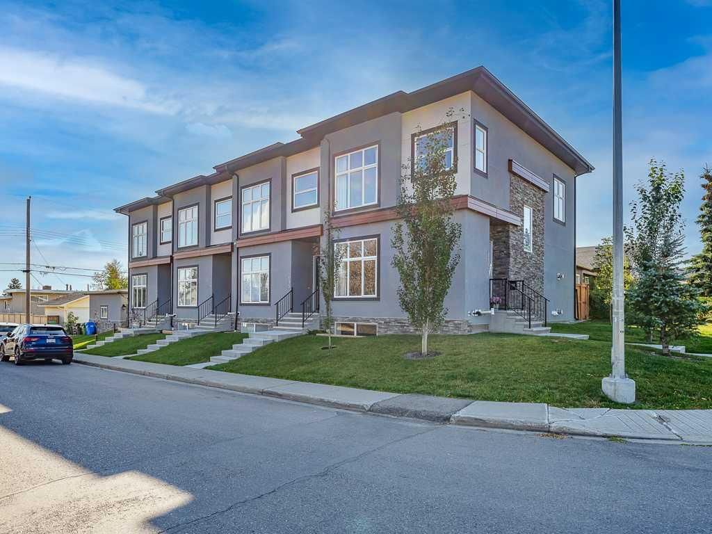 Main Photo: 1104 40 Street SW in Calgary: Rosscarrock Row/Townhouse for sale : MLS®# A2083001