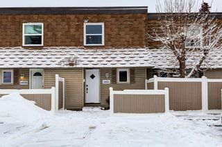 Photo 2: 4403 Bow Trail SW in Calgary: Rosscarrock Row/Townhouse for sale : MLS®# A2022311