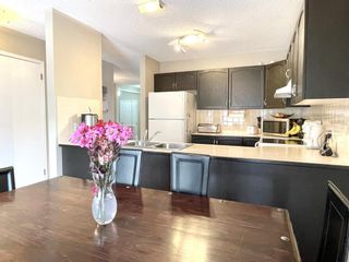 Photo 8: 113 Tuscany Valley Way NW in Calgary: Tuscany Detached for sale : MLS®# A2023563