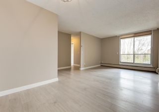 Photo 2: 406 4944 Dalton Drive NW in Calgary: Dalhousie Apartment for sale : MLS®# A1220313