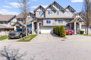 Photo 1: 42 18181 68 Avenue in Surrey: Cloverdale BC Townhouse for sale in "Magnolia" (Cloverdale)  : MLS®# R2568786