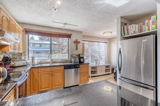 Photo 10: 11 140 Point Drive NW in Calgary: Point McKay Row/Townhouse for sale : MLS®# A2033887