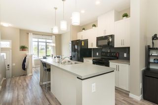 Photo 4: 207 Copperstone Park SE in Calgary: Copperfield Row/Townhouse for sale : MLS®# A1068129