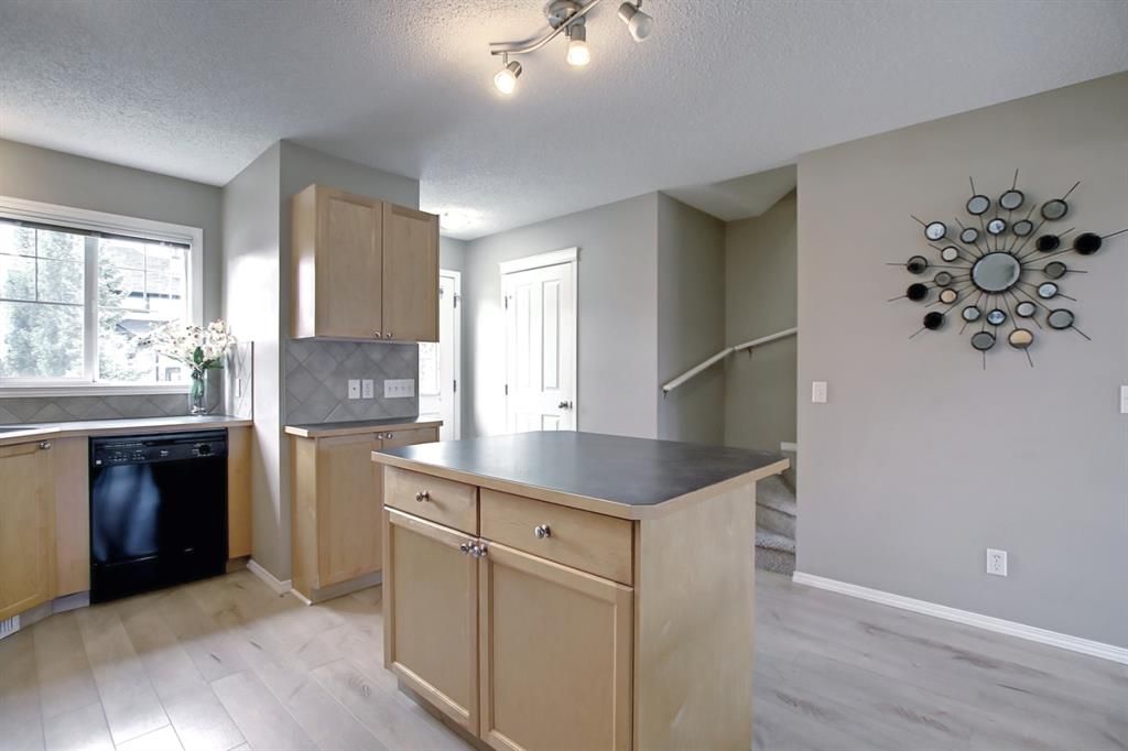 Photo 7: Photos: 502 140 Sagewood Boulevard SW: Airdrie Row/Townhouse for sale : MLS®# A1243853