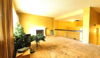 Photo 11: 396 Brae Glen Crescent SW in Calgary: Braeside Row/Townhouse for sale : MLS®# A2083820