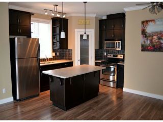 Photo 2: 410 2038 SANDALWOOD Crescent in Abbotsford: Central Abbotsford Condo for sale in "The Element" : MLS®# F1404533