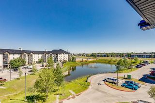 Photo 26: 7403 304 Mackenzie Way SW: Airdrie Apartment for sale : MLS®# A1251468