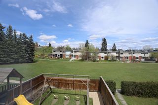 Photo 3: 330 Garry Crescent NE in Calgary: Greenview Row/Townhouse for sale : MLS®# A1218045