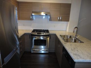 Photo 6: 417 1153 KENSAL Place in Coquitlam: New Horizons Condo for sale in "ROYCROFT" : MLS®# V1109845