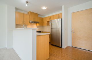 Photo 3: 310 300 KLAHANIE Drive in Port Moody: Port Moody Centre Condo for sale in "TIDES" : MLS®# R2779830