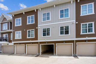 Photo 25: 811 Cranbrook Walk SE in Calgary: Cranston Row/Townhouse for sale : MLS®# A1202739