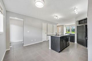 Photo 14: 212 Walden Drive SE in Calgary: Walden Row/Townhouse for sale : MLS®# A1236888