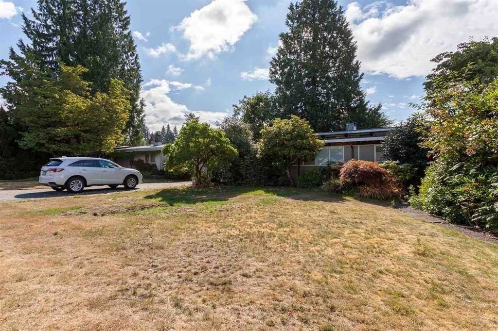 Main Photo: 4053 SUNNYCREST Drive in North Vancouver: Forest Hills NV House for sale : MLS®# R2876352