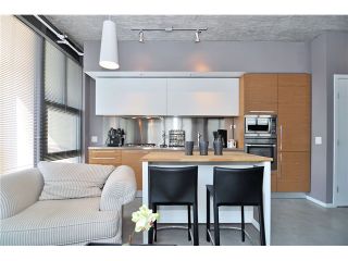 Photo 8: 404 388 W 1ST Avenue in Vancouver: False Creek Condo for sale in "THE EXCHANGE" (Vancouver West)  : MLS®# V1028659