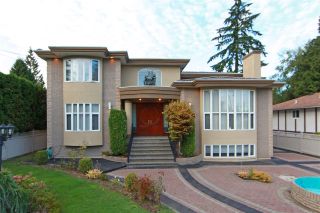 Photo 1: 7501 COLLEEN Street in Burnaby: Government Road House for sale (Burnaby North)  : MLS®# R2210253