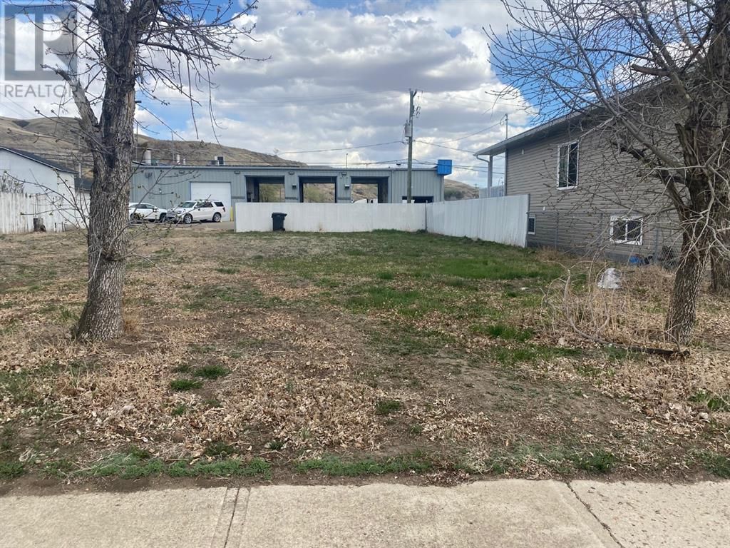 Main Photo: 104 Poplar  Street in Drumheller: Vacant Land for sale : MLS®# A1109169
