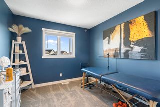 Photo 21: 384 Belmont Avenue SW in Calgary: Belmont Row/Townhouse for sale : MLS®# A2052359