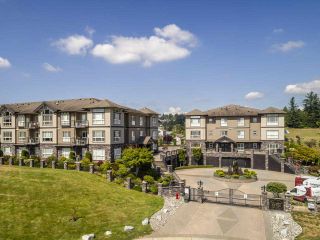 Photo 1: B101 33755 7TH Avenue in Mission: Mission BC Condo for sale in "The Mews" : MLS®# R2491641