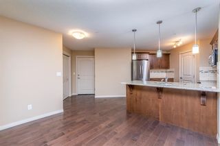 Photo 7: 1210 130 Panatella Street NW in Calgary: Panorama Hills Apartment for sale : MLS®# A2000569