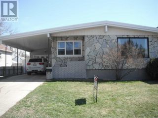 Photo 1: 113 14 Street N in Lethbridge: House for sale : MLS®# A2105690
