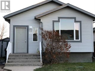 Photo 1: 139 Blackfoot Court W in Lethbridge: House for sale : MLS®# A2094125