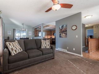 Photo 3: 12 140 STRATHAVEN Circle SW in Calgary: Strathcona Park Semi Detached for sale : MLS®# C4229318