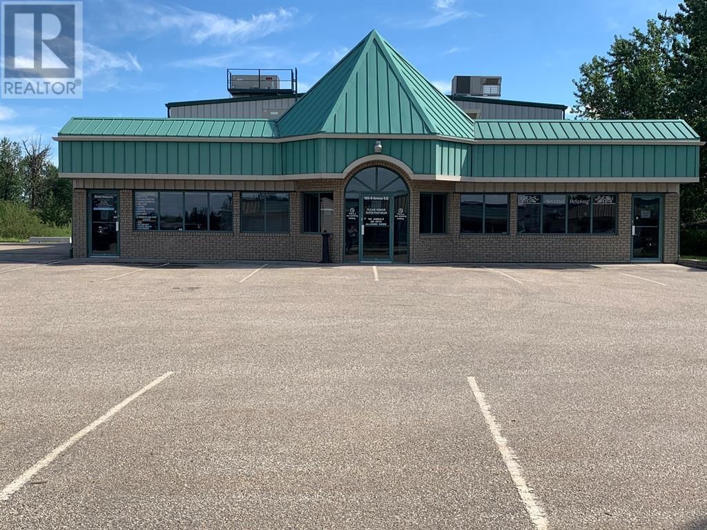 Main Photo: 205, 105 6 Avenue SE in Slave Lake: Office for rent : MLS®# A2031252