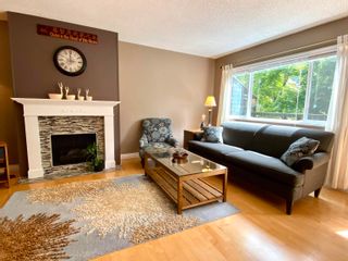 Photo 1: 7370 CAPISTRANO Drive in Burnaby: Montecito Townhouse for sale (Burnaby North)  : MLS®# R2694741