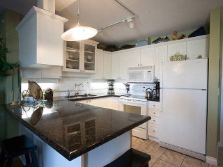 Photo 4: 327 19750 64 Avenue in Langley: Willoughby Heights Condo for sale in "The Davenport" : MLS®# F1418142