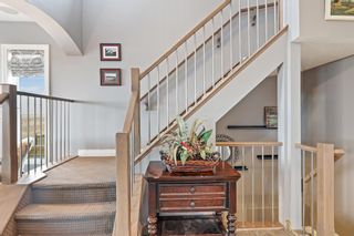 Photo 5: 207 Bishop Mews NW: Langdon Detached for sale : MLS®# A1193856
