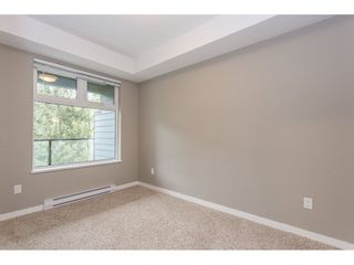 Photo 16: 104 2238 WHATCOM Road in Abbotsford: Abbotsford East Condo for sale in "Waterleaf" : MLS®# R2260128