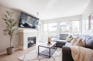 Photo 1: 206 3110 DAYANEE SPRINGS Boulevard in Coquitlam: Westwood Plateau Condo for sale in "LEDGEVIEW" : MLS®# R2869612